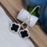 Aretes colgantes van cleef negros con circonia